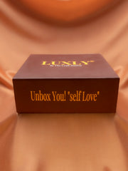 Brown box with 'Luxly' branding and text on a matching fabric background